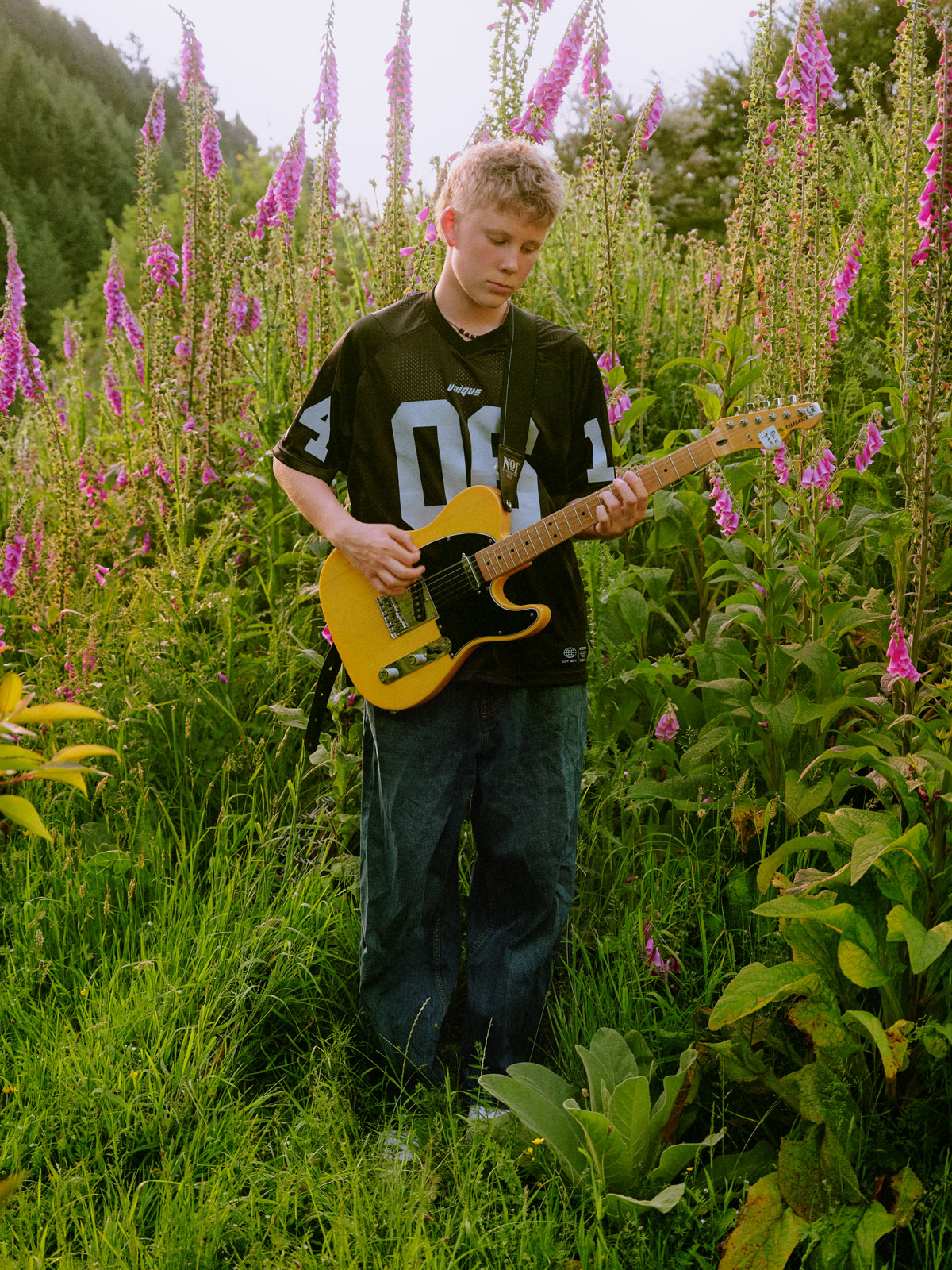 Oscar playing guitar, Maitai Valley